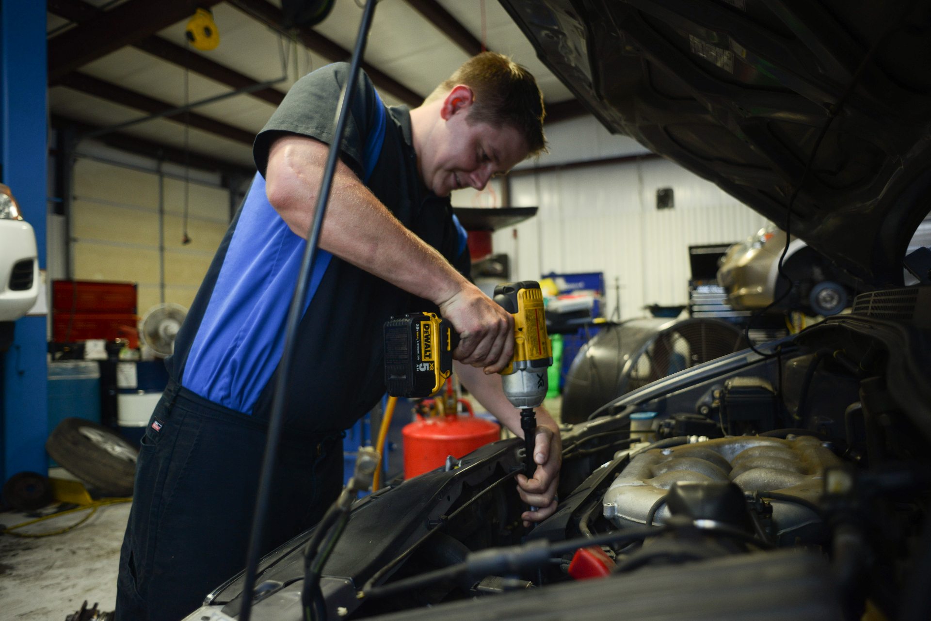 Mechanic working on engine
